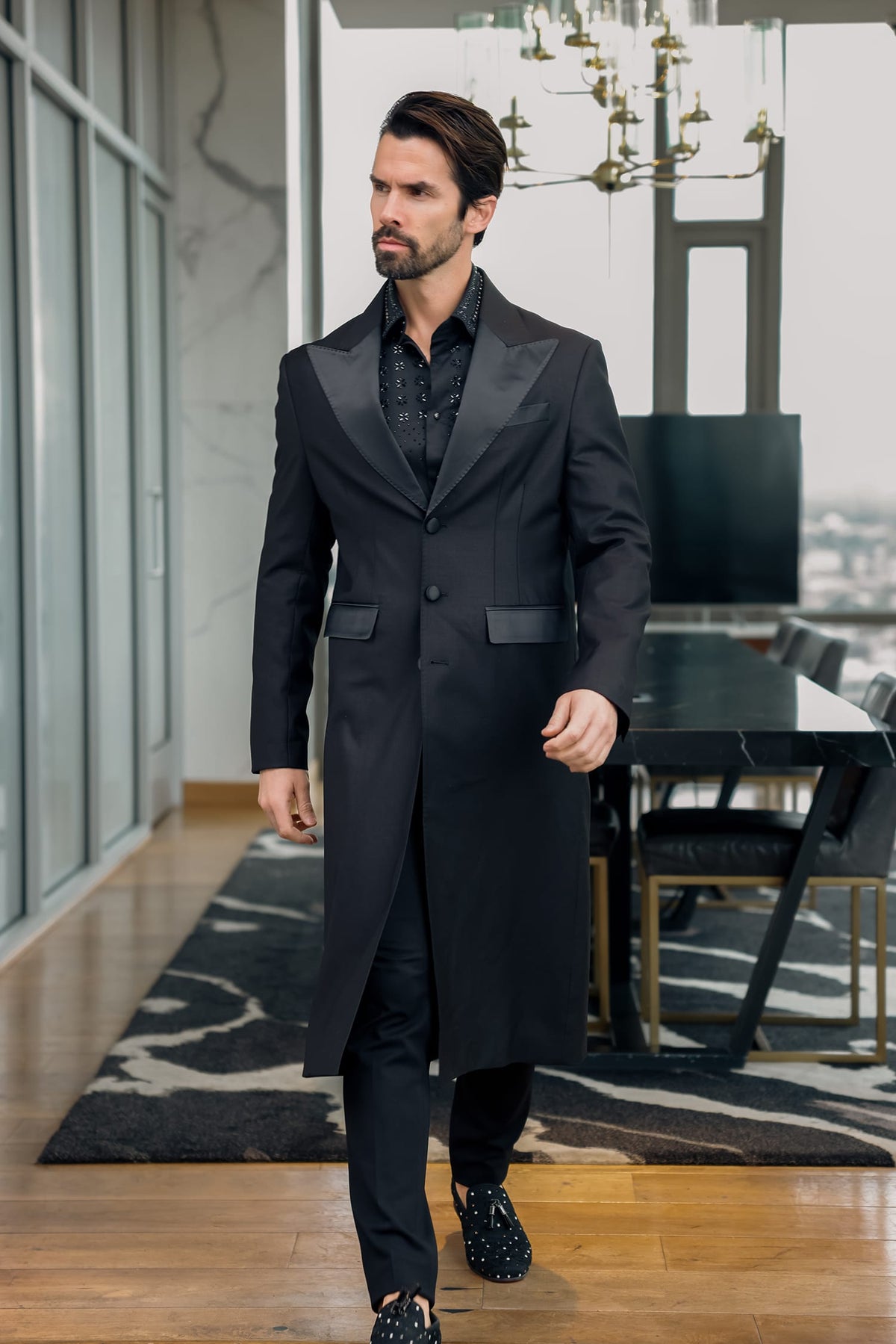 Man wearing the BARABAS Fabledrobe solid long coat with peak lapel